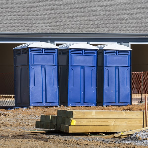 what is the cost difference between standard and deluxe portable restroom rentals in Bienville